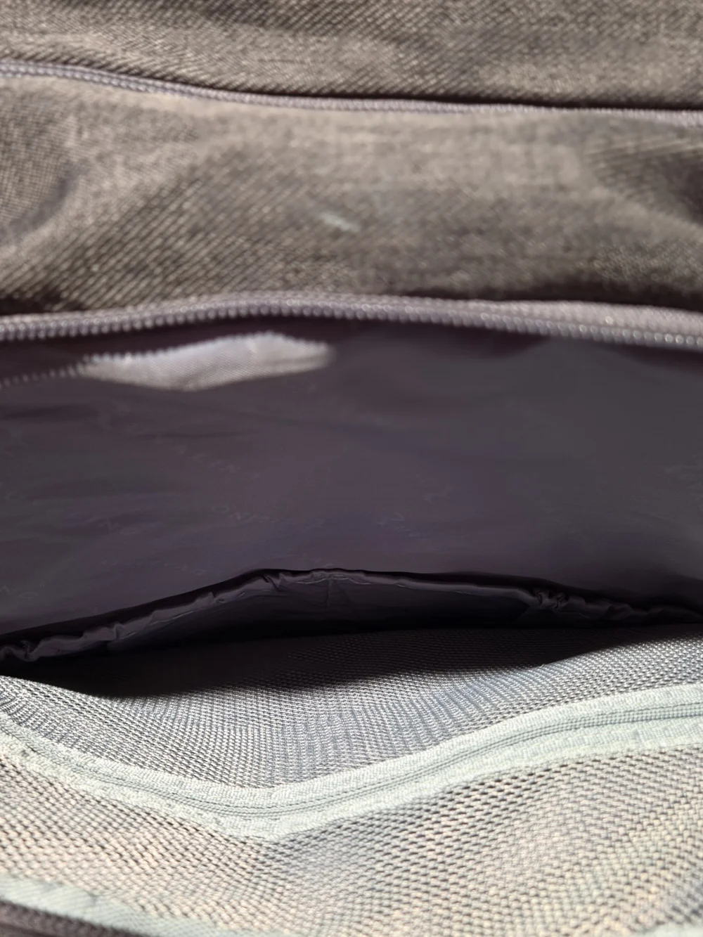 dark gray quilted Ruvalino diaper bag backpack.